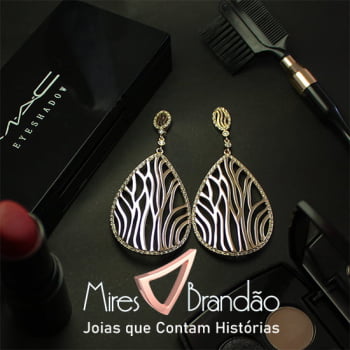 Brinco gota vazado cravejado